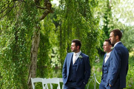 100 Best Barn Wedding Photos a groom waits for the bride with his groomsmen