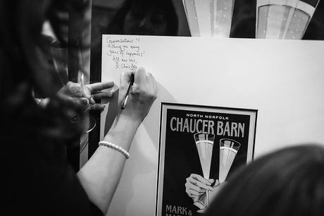 100 Best Barn Wedding Photos a guest signs the picture frame at chaucer barn