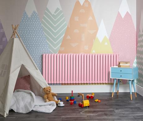 Pink Milano Aruba designer radiator in a playroom