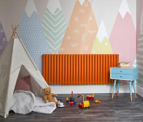 Orange Milano Aruba designer radiator in a playroom