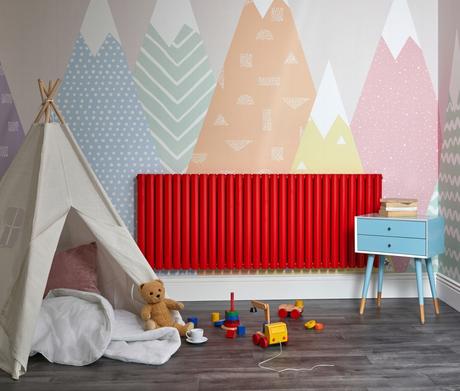 Red Milano Aruba designer radiator in a playroom