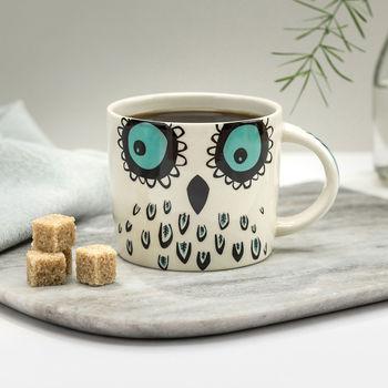 A mug featuring an owl design