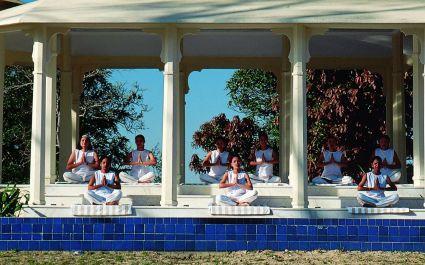 Outdoor group yoga at Ananda Spa in Rishikesh, The Himalayas