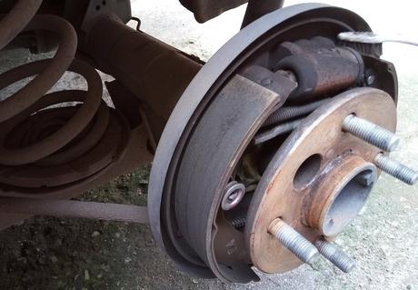 Brake pads with asbestos material