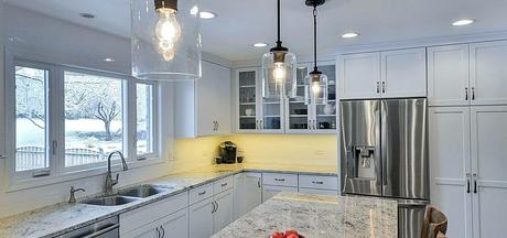 chandelier above island chandeleur lodge how to choose the right kitchen lights home