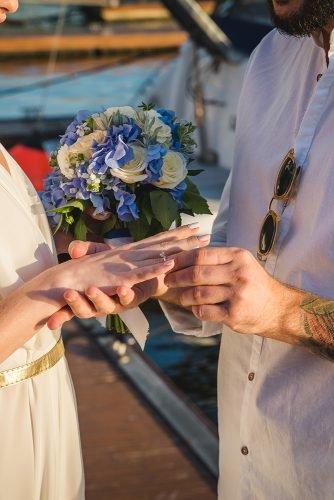 planning a quick wedding bride and groom exchanging rings