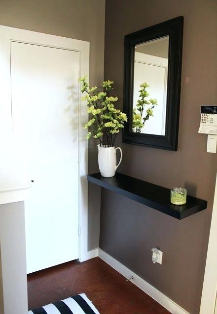 small entry mirror entryway with key hooks if you have a way in your house or condo give