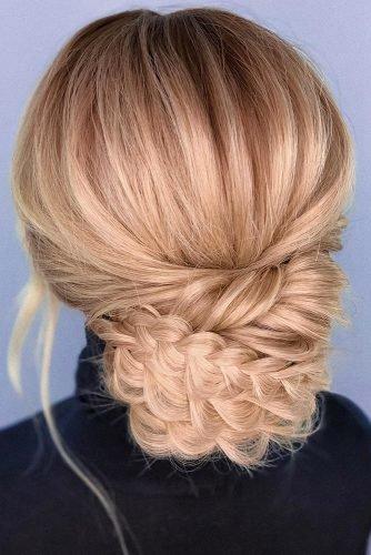 wedding hair trends blonde textured braided elegant chignon on medium length knoxvillebridalhair