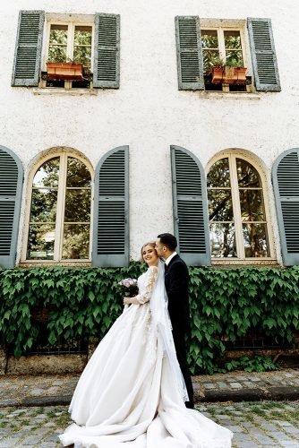 wedding venue ideas photo of bride and groom standing near hotel