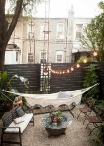 string lights and hammock in a tiny yard