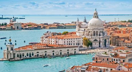 Enchanting Travels Italy Tours Panoramic aerial cityscape of Venice with Santa Maria della Salute church, Veneto, Italy