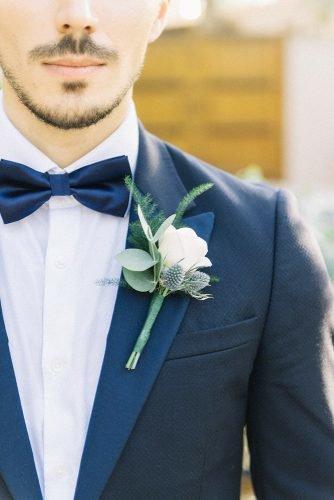 classic blue wedding groom suit with blue bow tie boutonniere with white flower liz jvr photography