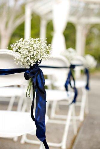 classic-blue-wedding-baby-breath-and-stripes-on-chairs-ann-wade-parrish-photography
