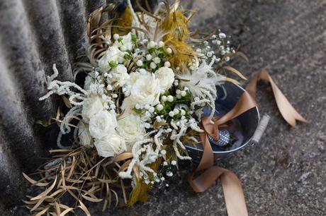 White and brown rustic bouquet in tin bucket. 