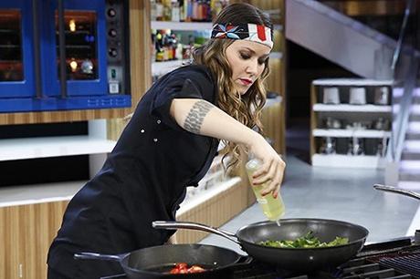 Woman-Cooking-With-Wok