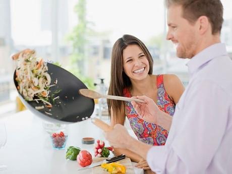 Couple-Cooking-With-Wok