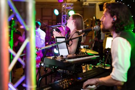 Band sings during London wedding. 