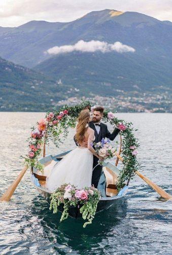 romantic photos wedding day flower wreath in boat roman_ivanov_weddings