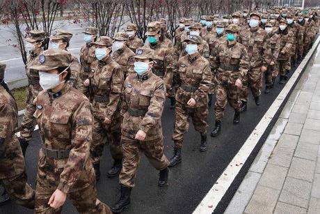 Members of a military medical team were deployed to Wuhan on Sunday.