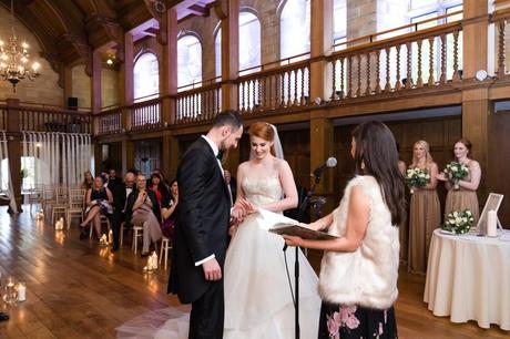 Bride looks at ring on her finger at Achnagairn Estate wedding. 