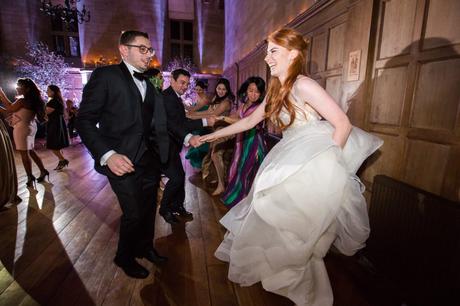 Dancing at wedding with redheaded bride. 