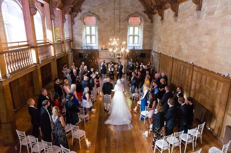 Bride walks up aisle at Achnagairn Estate