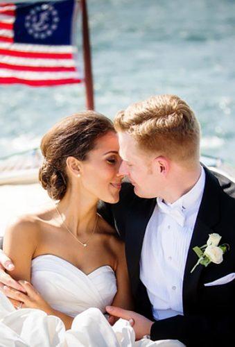wedding exit photo ideas tender kiss boat with flag traceybuyce