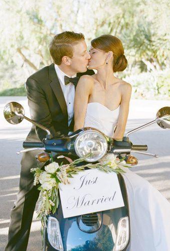 wedding exit photo ideas coach kiss couple scooter with sign aaron delesie