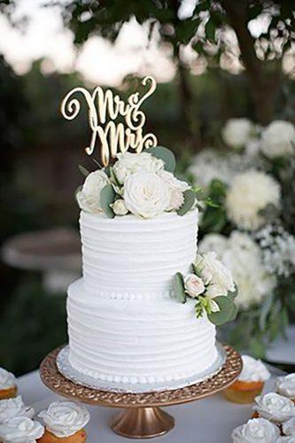 chic wedding cakes with white roses and greenery