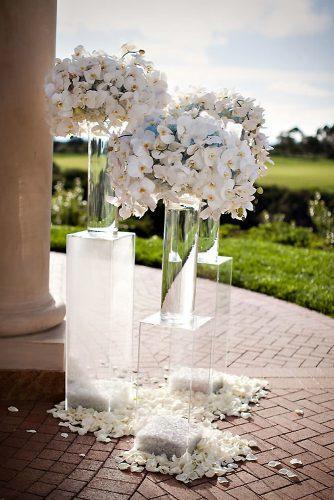 wedding trends 2019 clean actylic stand in tall glass vaces and chic white orchid flowers jasmine star
