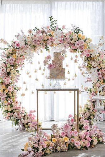 wedding trends 2019 elegant cake table with hanging pare pink white orchid flower arch georgejohnphotography