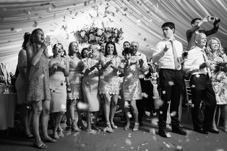 wedding guests shoot confetti cannons at me