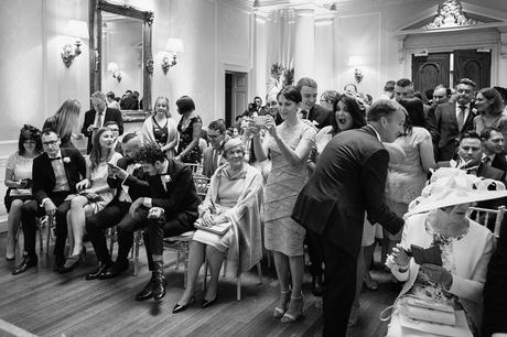 guests take photos at a hedsor house wedding
