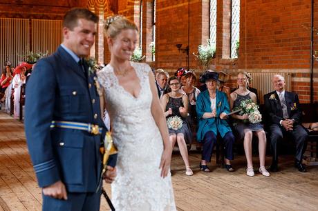 the brides family look on at a gressenhall museum wedding
