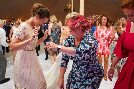 guests dancing at a marquee wedding