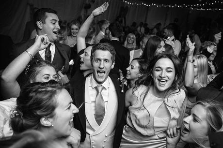 wedding guests dance at a suffolk marquee wedding