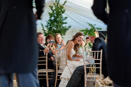 laughter during the speeches at a suffolk marquee wedding