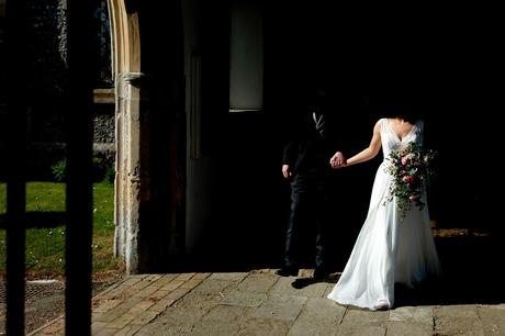 bride and groom leave aldeburgh church