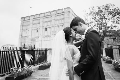 bride and groom together outside norwich castle