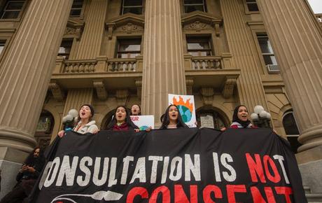 Young people stand on the steps of the Alberta legislature during the climate strike in Edmonton in 2019. Youth are often seen as problems rather than as people who are creating solutions. 