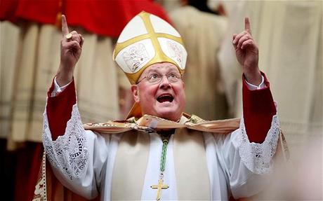 Cardinal Timothy Dolan of New York, the president of the US Conference of Catholic Bishops, accused Mr. Obama of 'strangling' the church with his birth control provision. Photo: Reuters.