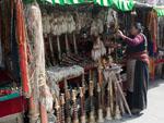 A Tibetan lady selling various items