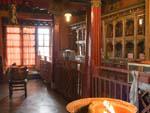 Inside the Drepung Monastery chapel, statues can be seen on the wall