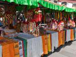 Barkhor Bazaar selling scarfs and prayer flags