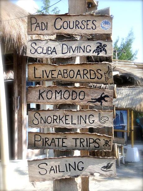 Snorkel, pirate trips, scuba, paid, sailing sign