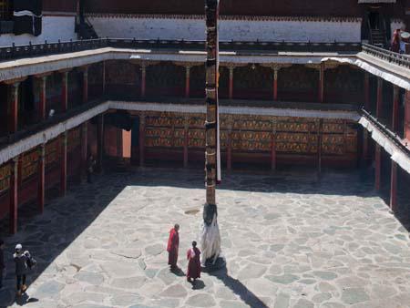 Large courtyard with prayer pole in the centre