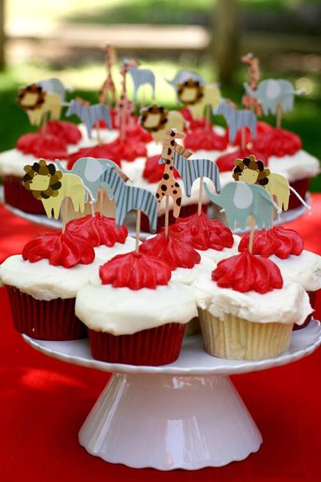 vintage circus birthday party: cupcakes, animal toppers, red, white