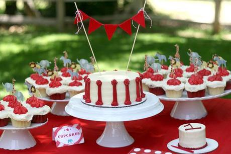 vintage circus birthday party: cake, garland, cupcakes, animal toppers, red, white