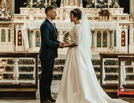 catholic wedding vows newlyweds at the church