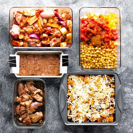 five freezer meals in various sized containers